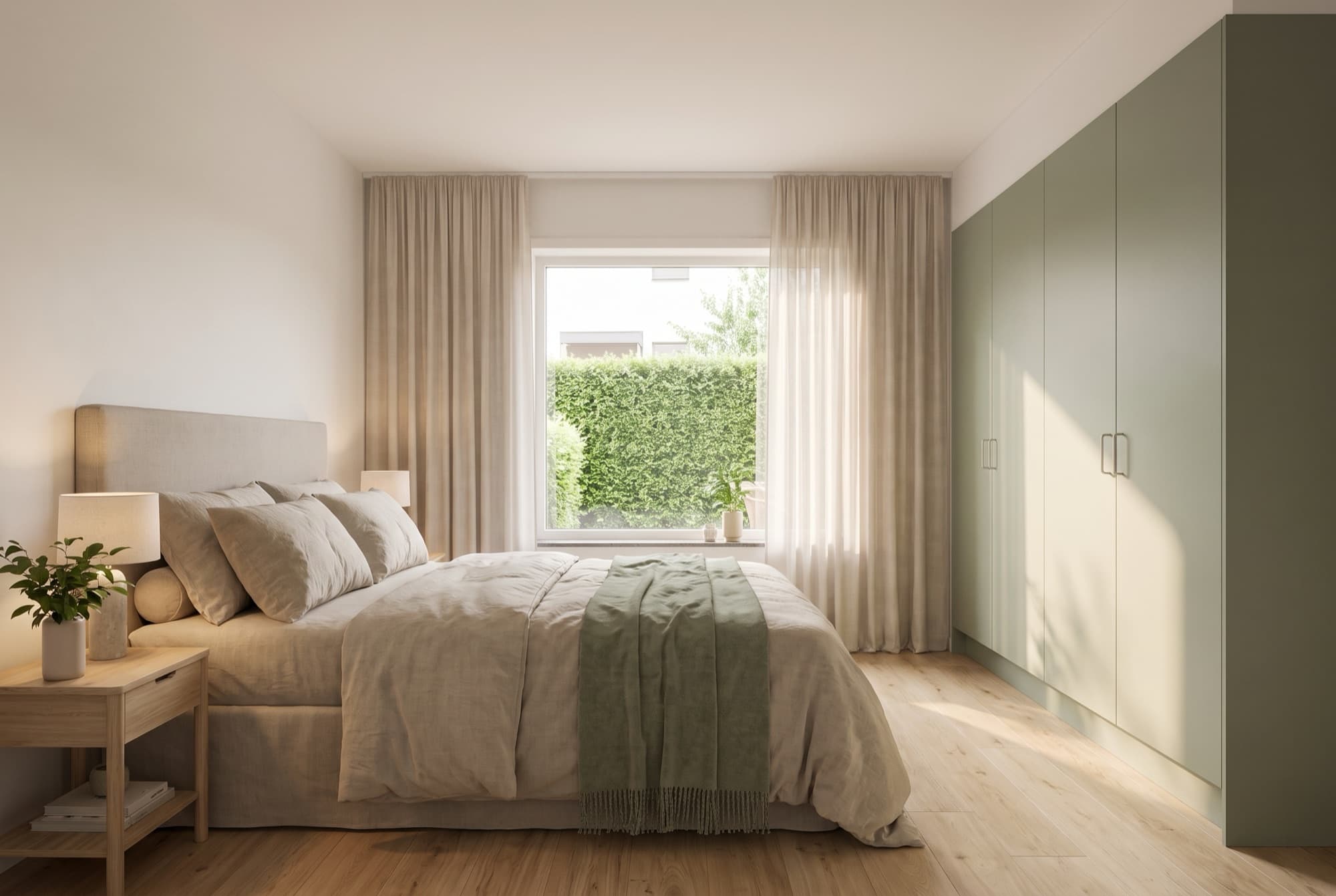 A1's bedroom, upholstered bed in linen tones, sage wardrobe wall and a window onto the garden hedge